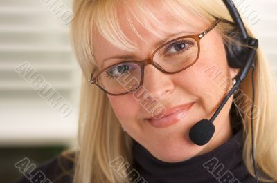 Attractive Businesswoman with Phone Headset