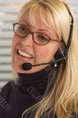 Attractive Businesswoman with Phone Headset