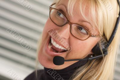 Attractive Businesswoman with Phone Headset