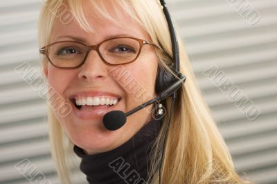 Attractive Businesswoman with Phone Headset
