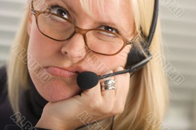 Attractive Businesswoman with Phone Headset