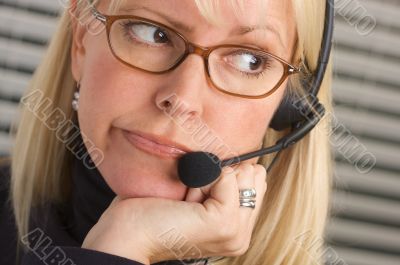 Attractive Businesswoman with Phone Headset
