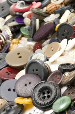 Sew colored button close up