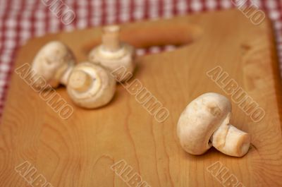 Mushrooms on Cutting Board