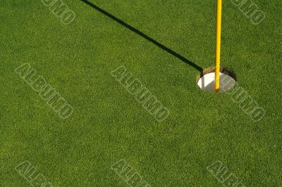 Lush, Freshly Mowed Golf Green & Flag
