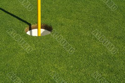 Lush, Freshly Mowed Golf Green & Flag