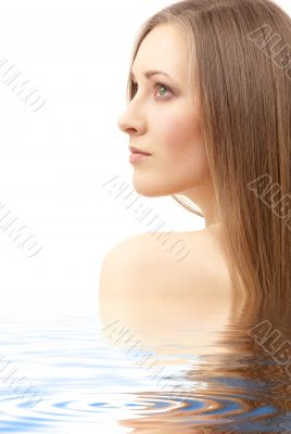 beautiful woman with long hair in water