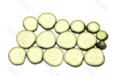 cutting cucumber on white