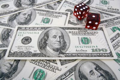 One Hundred Dollar Bills & Red Dice