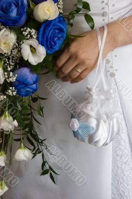 Wedding bouquet and hand