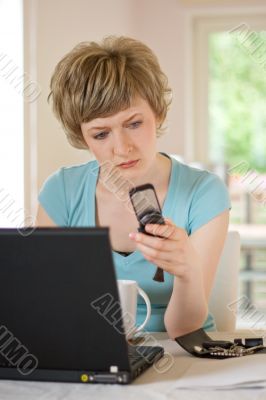 young woman working on a laptop