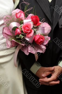 Wedding bouquet and hands