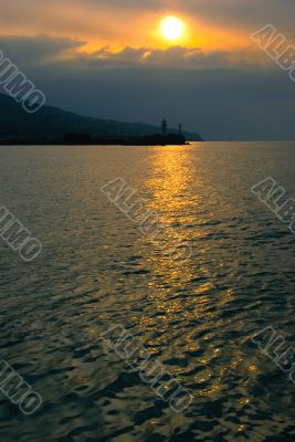 Cloudy sunrise above seamark, Yalta