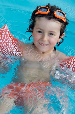 Child in the pool on holiday