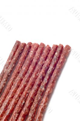 smoked wurst on white close up