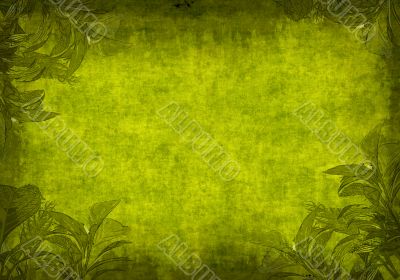 Grunge background with green leaves