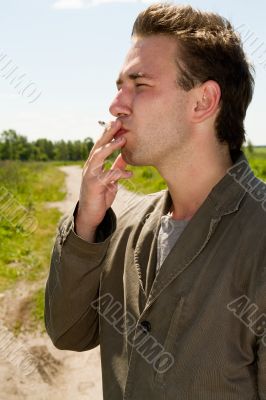 man smokes