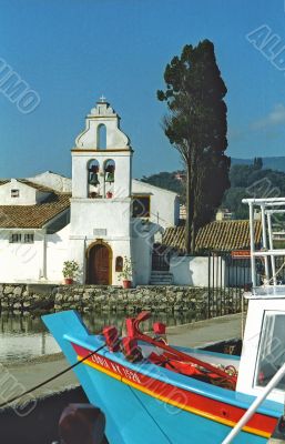 Church and a boat in Corfu island