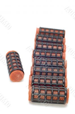 Red hair-rollers close up