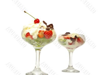 Whipped cream and strawberrie isolated