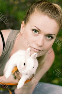 girl with her white rabbit