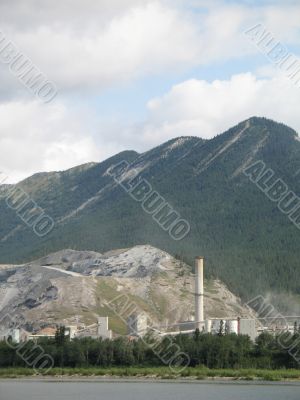 industrial building at the foot of a mountain