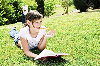 Girl reverie  above the book