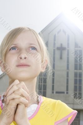 Teenager girl praying