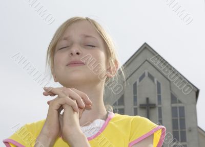 Teenager girl praying