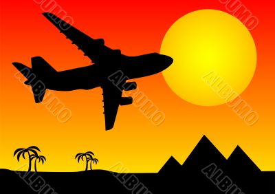 Aeroplane above pyramids