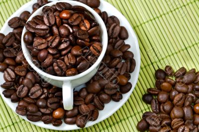 Coffee beans in a cup