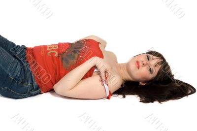 The young woman lays on a back. Isolated.