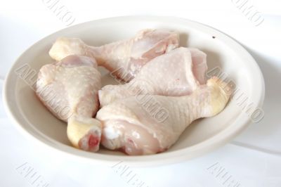 Raw chicken drumsticks