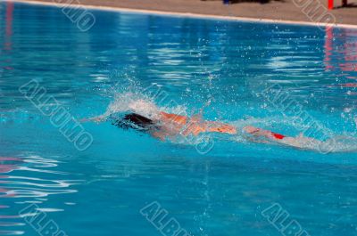 The swimmer in water.