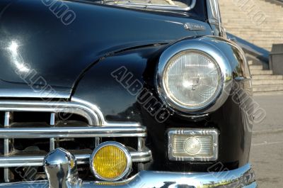 The right headlight of the old automobile