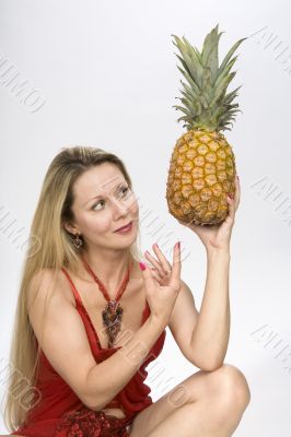 Woman with pineapple