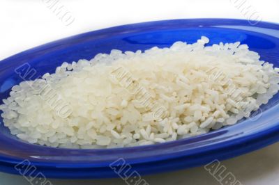 Rice on blue plate