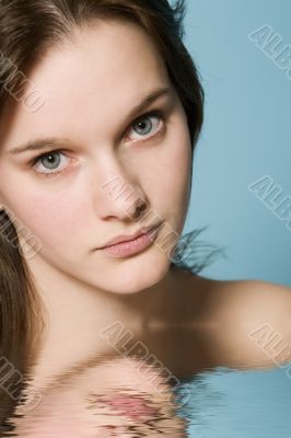 Portrait of a girl on a blue background
