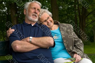 Elderly couple enjoying eachother