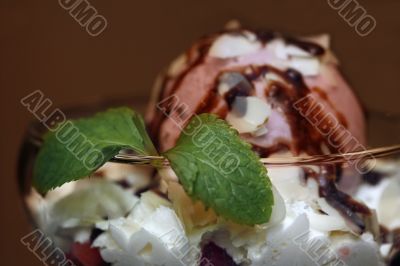 Ice-cream in a glass glass with mint