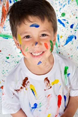 Boy playing with painting