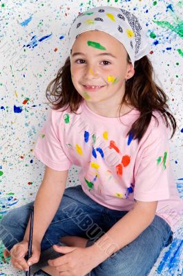 Girl playing with painting