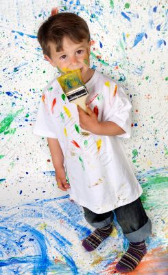 Boy playing with painting