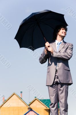 Businessman with umbrella