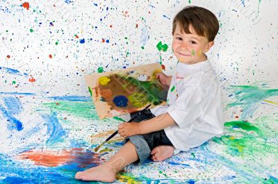 Boy playing with painting