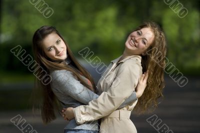 two smilling girlfriends