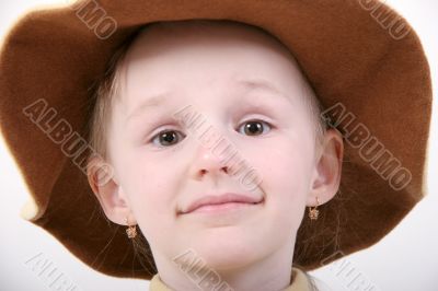 happy girl in brown hat