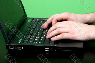 man work with laptop