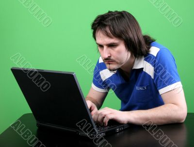 man work with laptop
