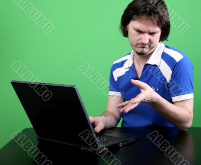 man work with laptop
